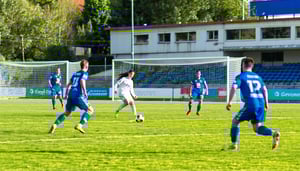 soccer game with a match being played